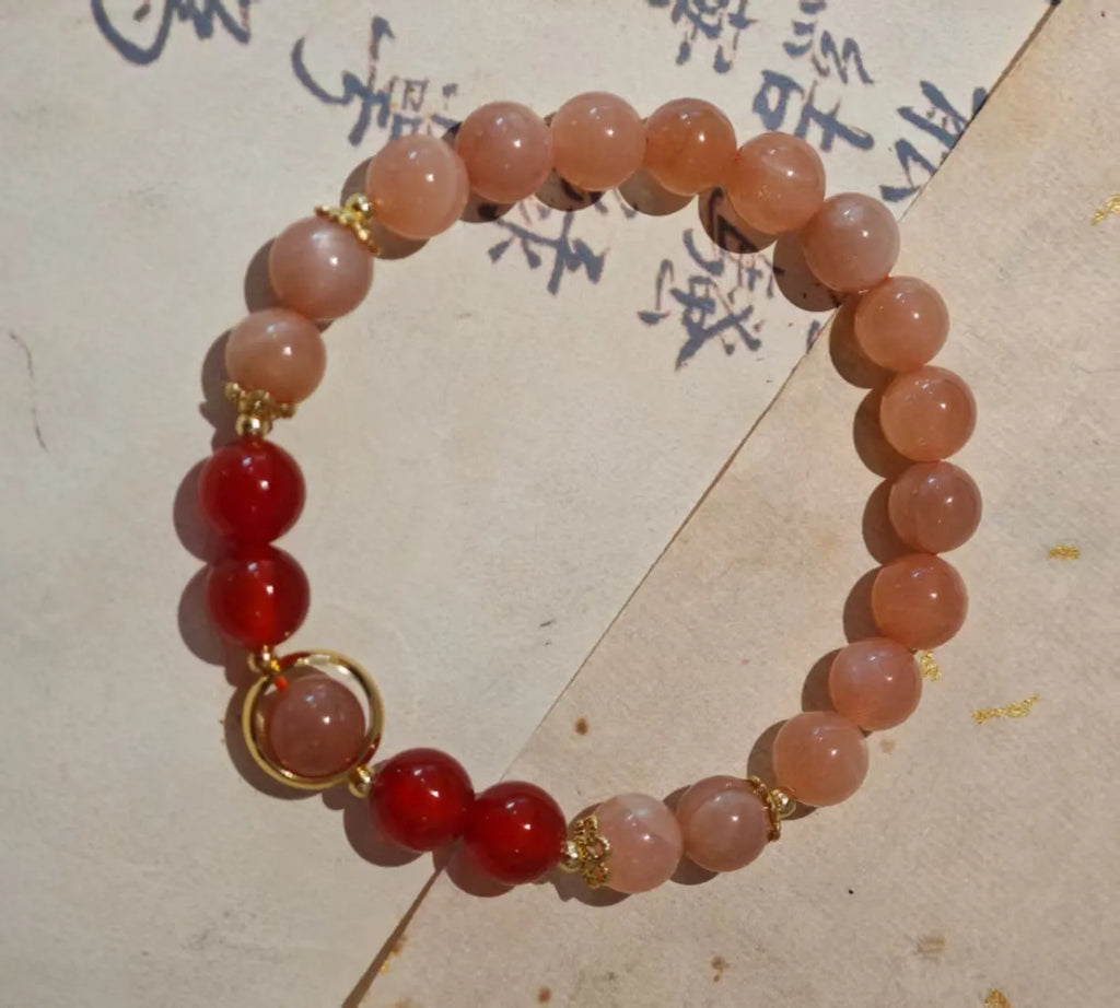Handmade red agate bracelet with 8mm sands orange sunstone beads and star xiangyun ethnic design
