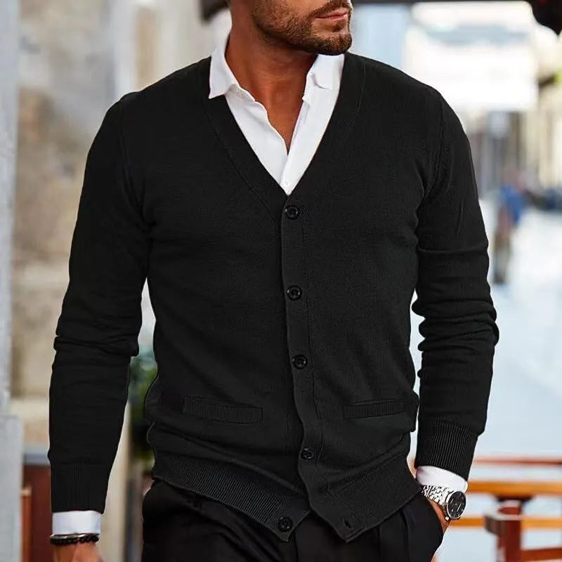 Men's slim fit acrylic cardigan sweater in dark grey, hanging on a hanger.