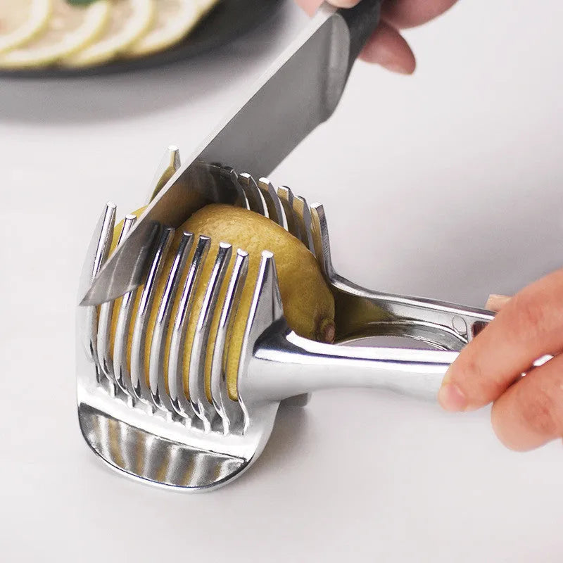 Silver plastic lemon slicer kitchen gadget on a countertop