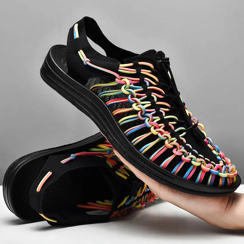 A pair of casual woven Roman sandals with an elastic drawstring tie across the instep.