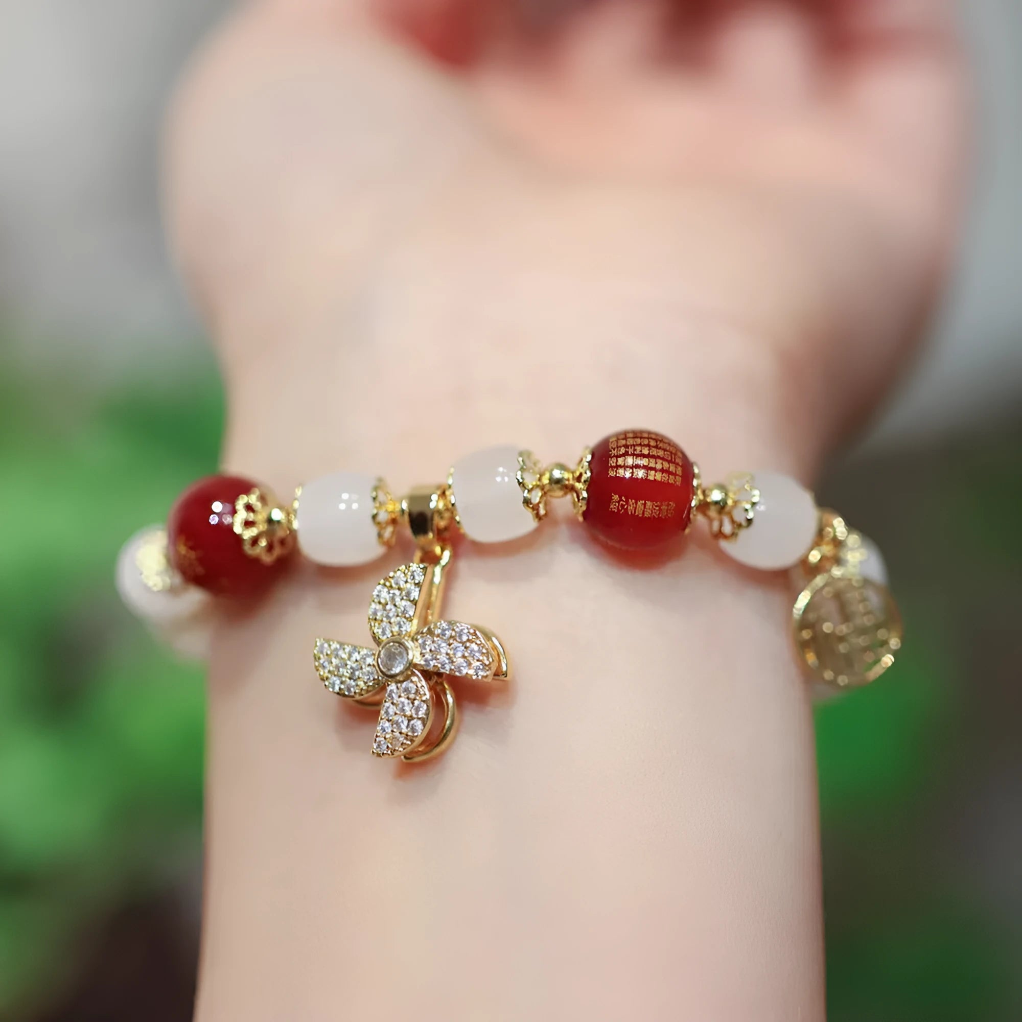 Chinese style women's coloured glaze bracelet with safety lock, windmill and bamboo charms