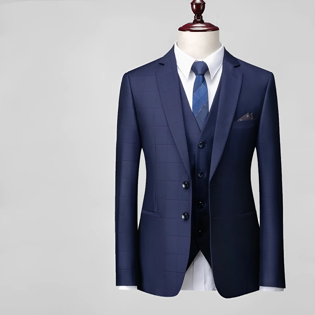 Men's navy blue slim fit three-piece suit with cotton blend fabric for business casual occasions