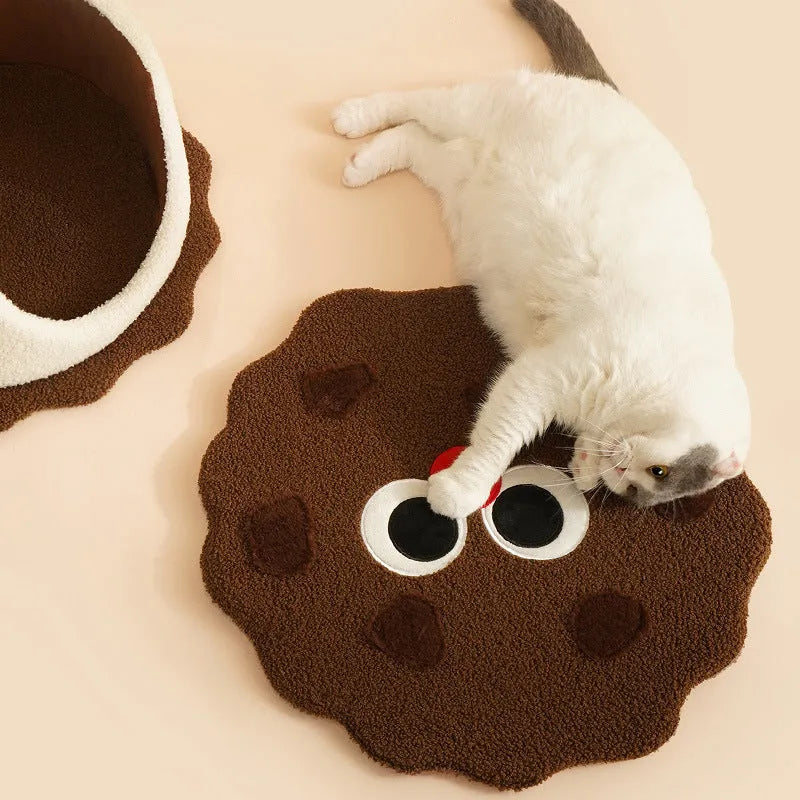 Khaki coloured sandwich cookie shaped closed cat bed house with front entrance and removable cushion