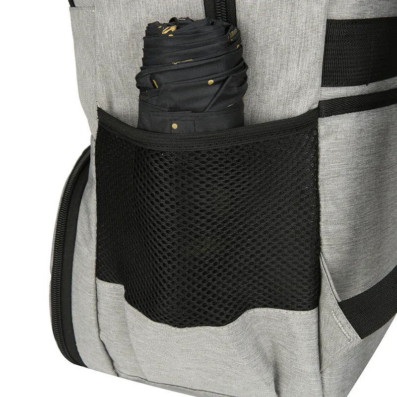 Light grey insulated Oxford cloth backpack with curved shoulder straps and wet-dry separation compartments.