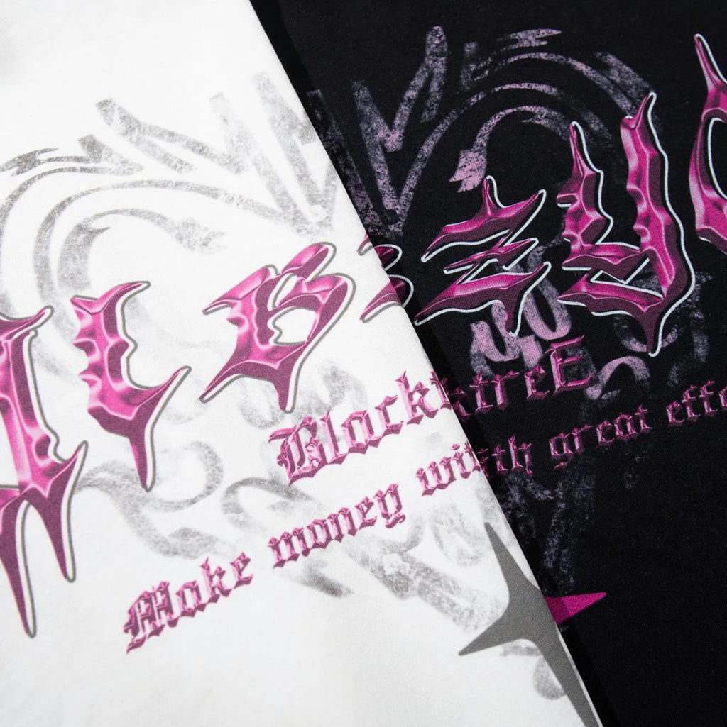 Retro printed loose fit cotton T-shirt for men in black, showing round neck and short sleeves.