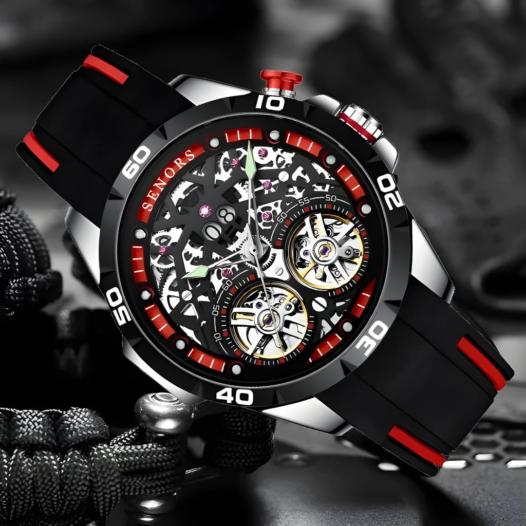 Blue automatic mechanical men's watch with luminous hands and a hollow skeleton dial on a wrist.