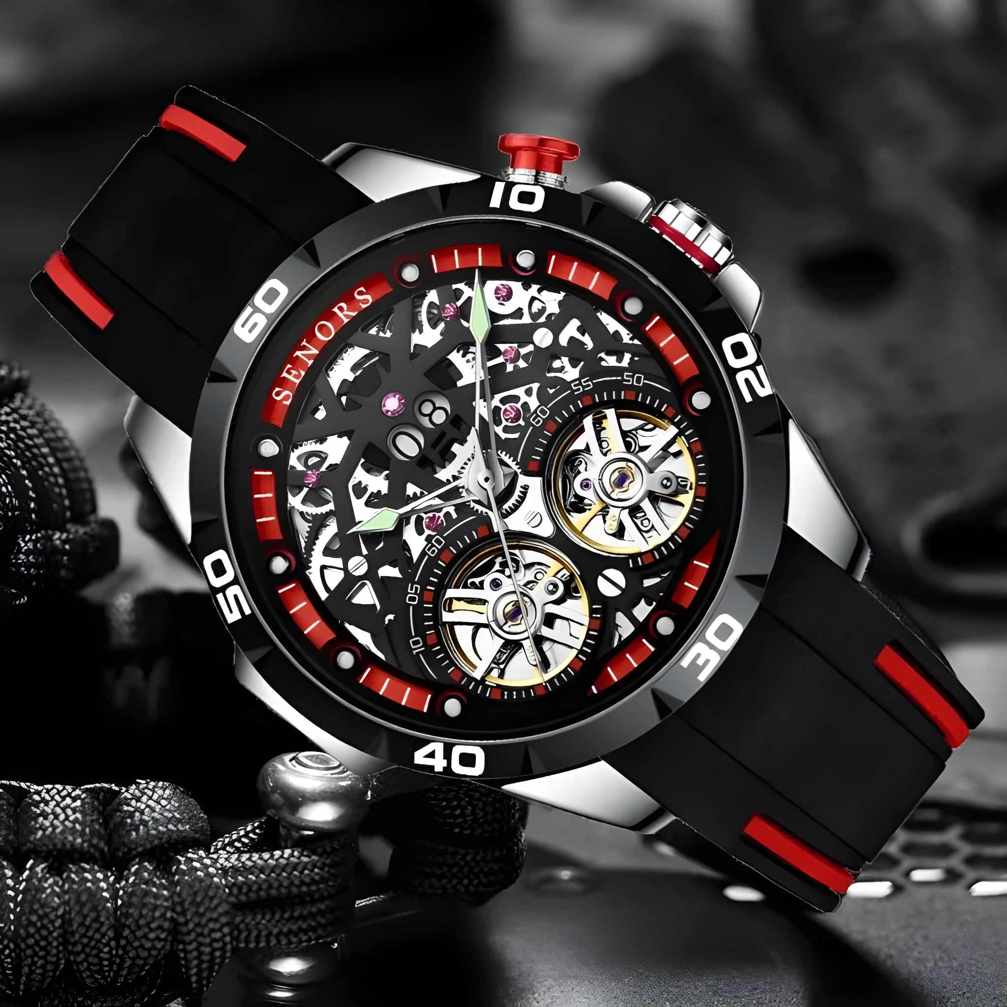 Blue automatic mechanical men's watch with luminous hands and a hollow skeleton dial on a wrist.