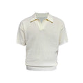 Men's creamy white polo shirt with short sleeves and a loose fit on a hanger.