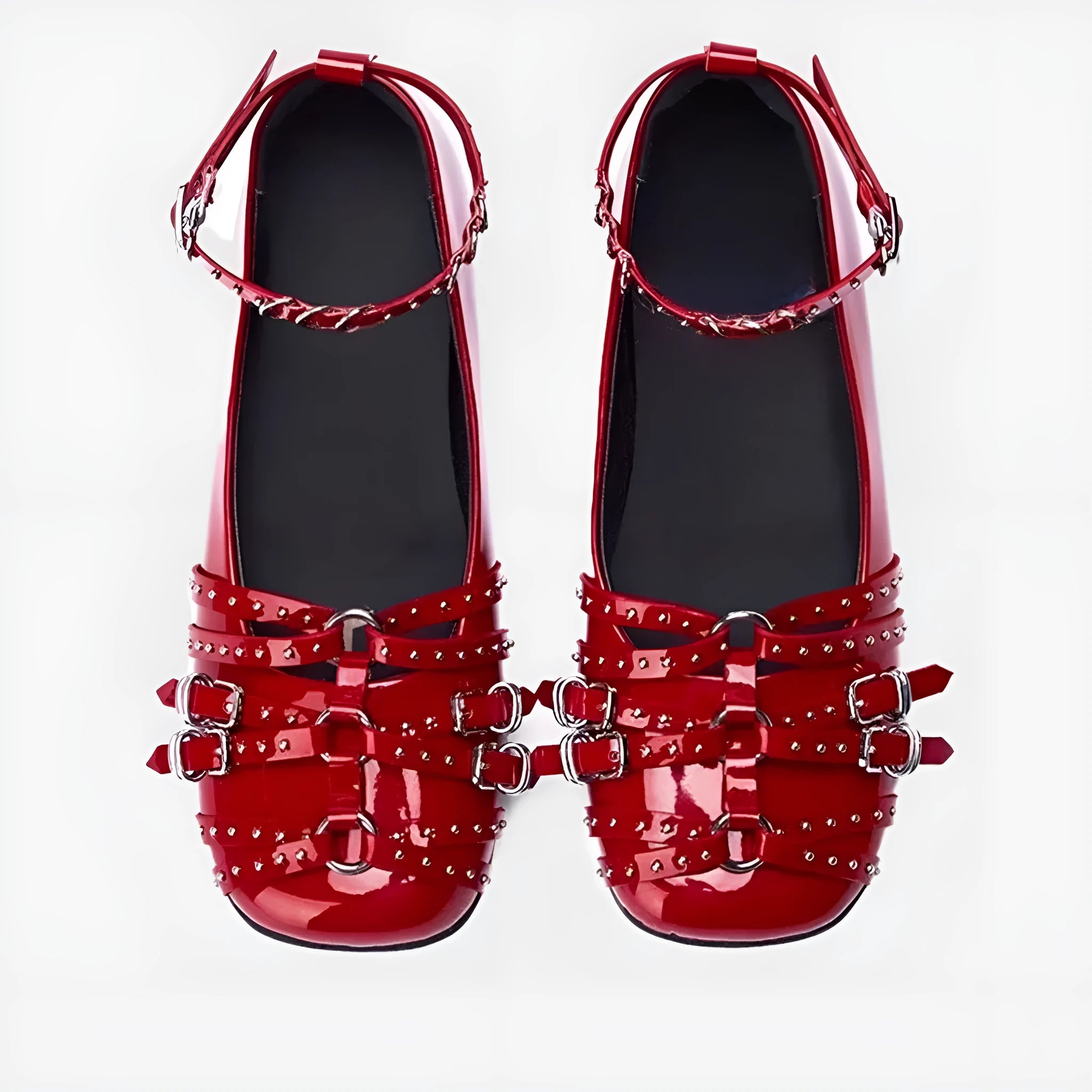 Women's black patent leather retro pumps with a square toe and buckle fastening on a low flat heel.