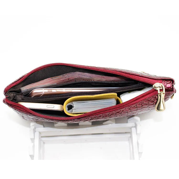 Women's black soft PU messenger bag with horizontal square shape showing dimensions