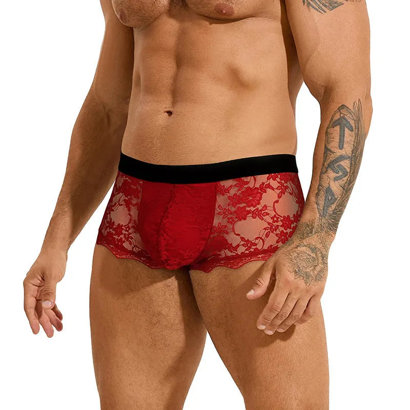Men's black lace briefs with hollow out see-through design showing nylon fabric construction