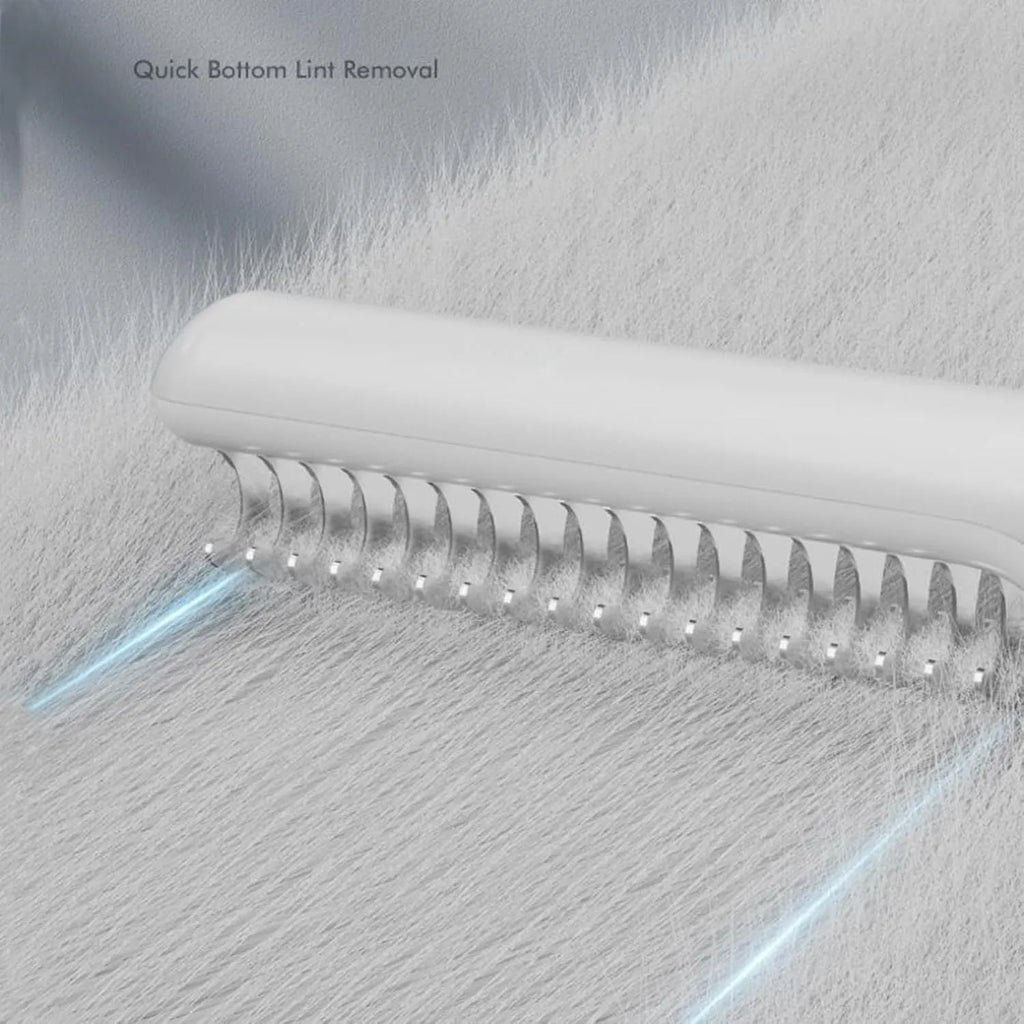 Pink and white stainless steel dog dematting comb with 18.8 cm handle for removing hair knots.