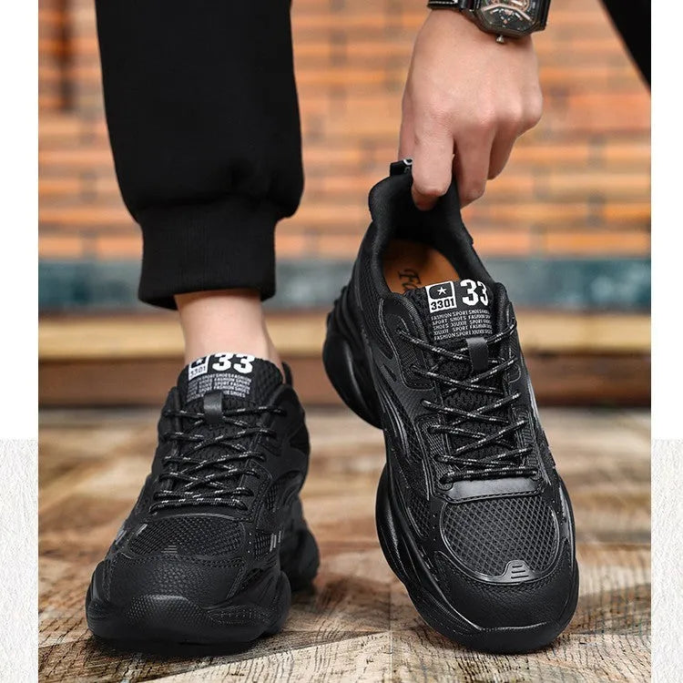 Breathable mesh casual tennis shoes with hidden elevator height increase in black with white stripes