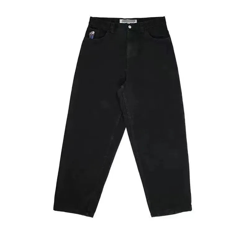 Men's straight-leg denim trousers with a retro pattern print in dark blue, shown laid flat.