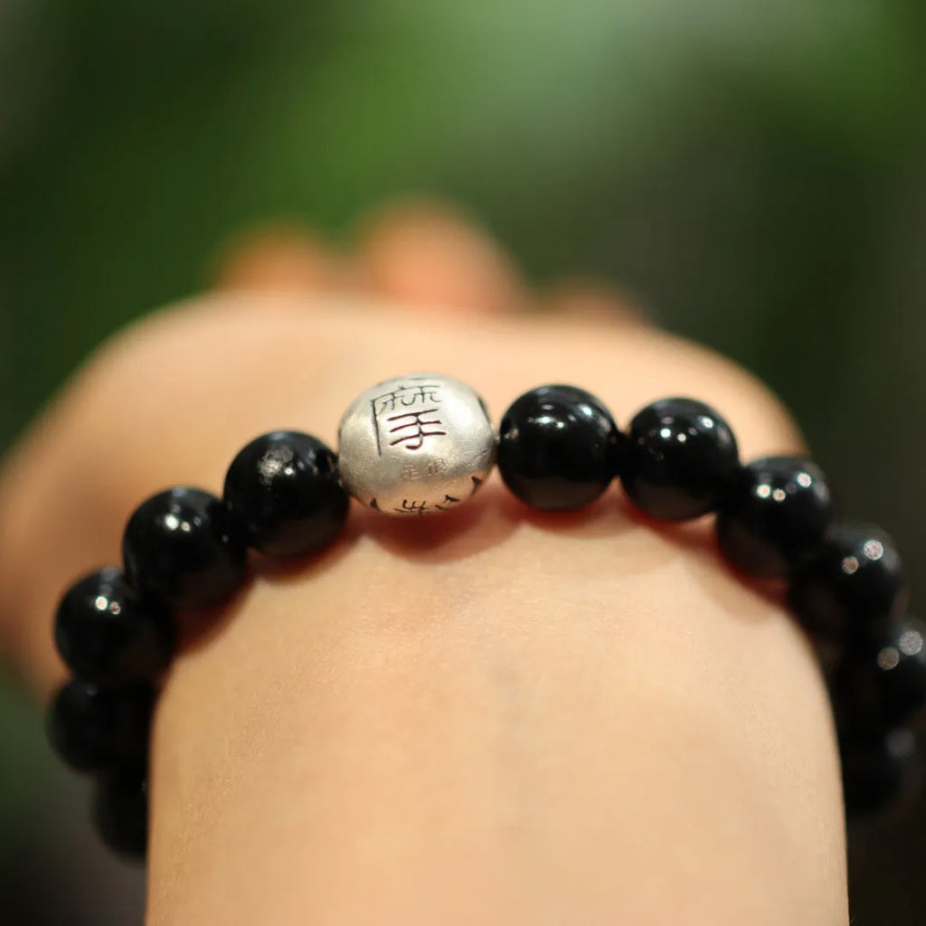 Black agate bracelet with 10mm beads and sterling silver clasp in Chinese style design