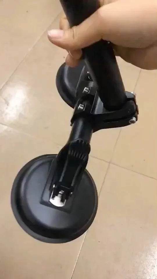 Black off-road car sucker base with round rubber suction cup for mounting on vehicle windows.