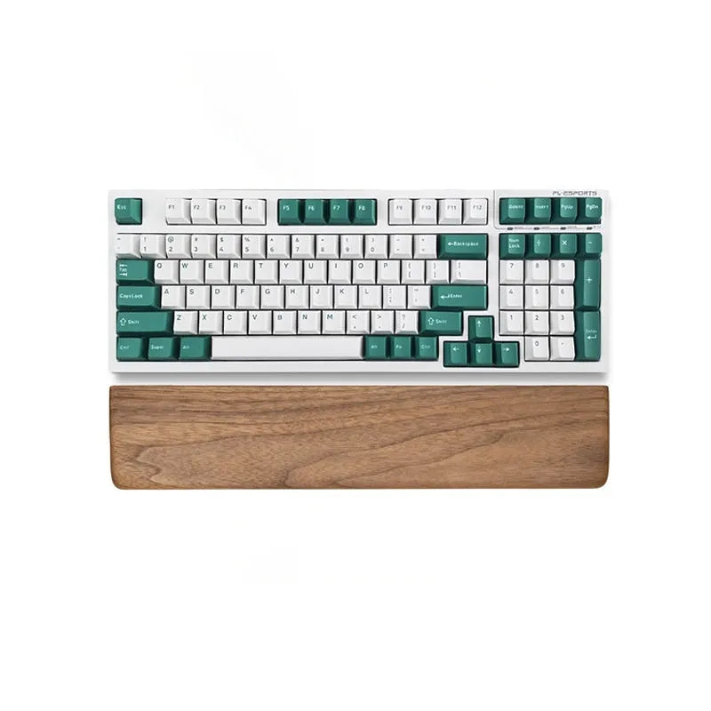 Black walnut wooden keyboard palm rest with wrist strap, 440mm long, on a desk