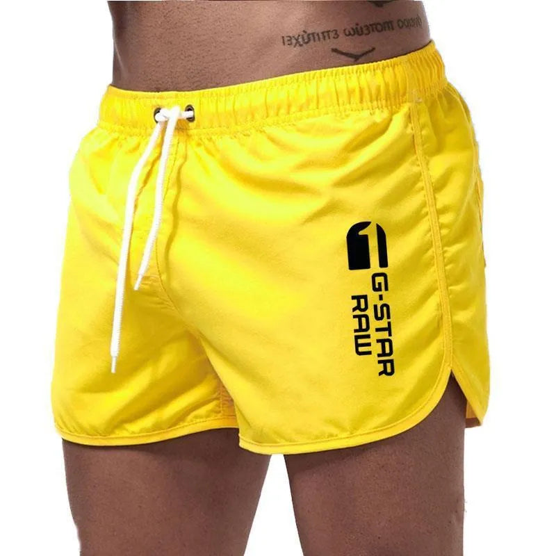 Man wearing lightweight polyester hemp-blended sports shorts in a vibrant colour with a micro-elastic waistband.