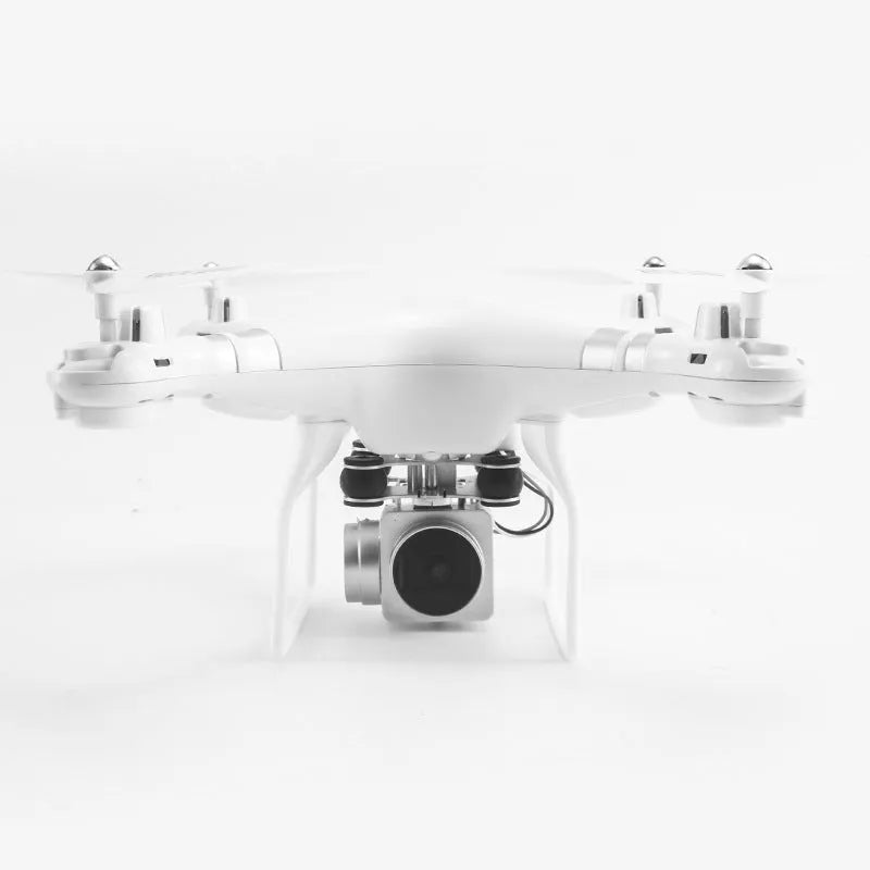 Black alloy remote control HD aerial photography drone with a handheld controller on a grassy field.