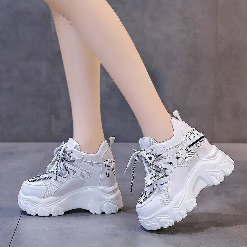 Women's white breathable mesh platform sports shoes with cross strap and 6-8 cm heel.
