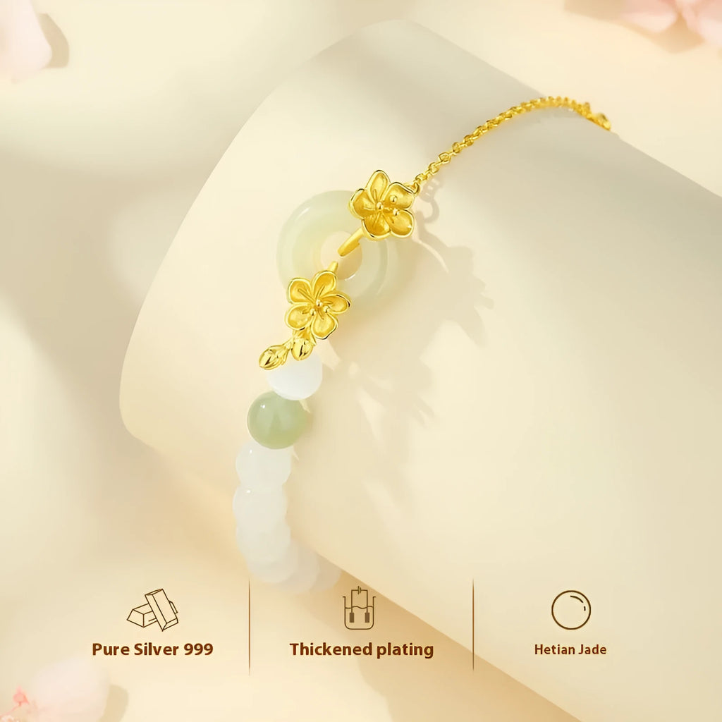 Pure silver peach blossom bracelet for women with a safety buckle in a gold electroplated finish.