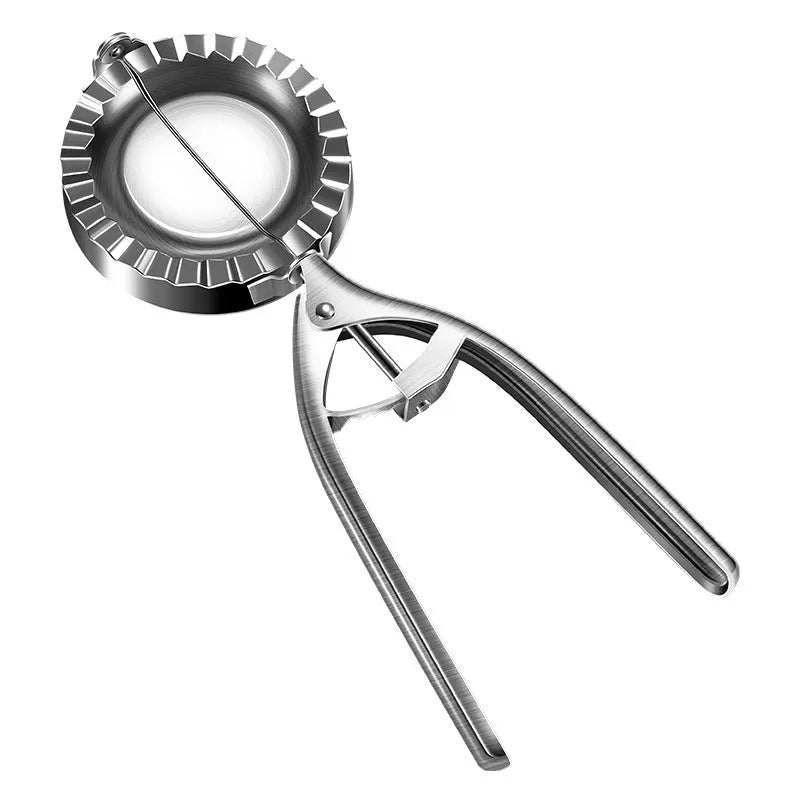 Silver stainless steel manual dumpling maker mould with handle for pressing and cutting wrappers.