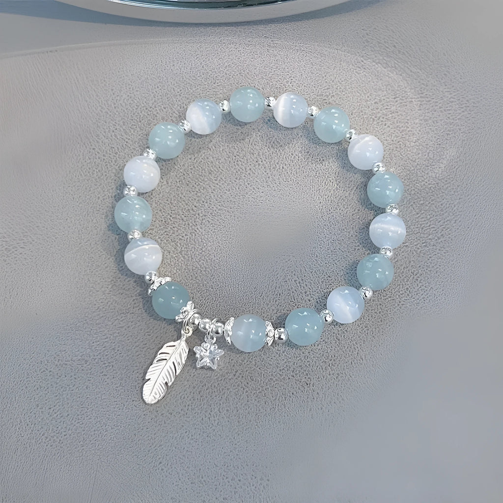 Korean style crystal bracelet with feather XINGX blue moonlight colour and eight Awn star design