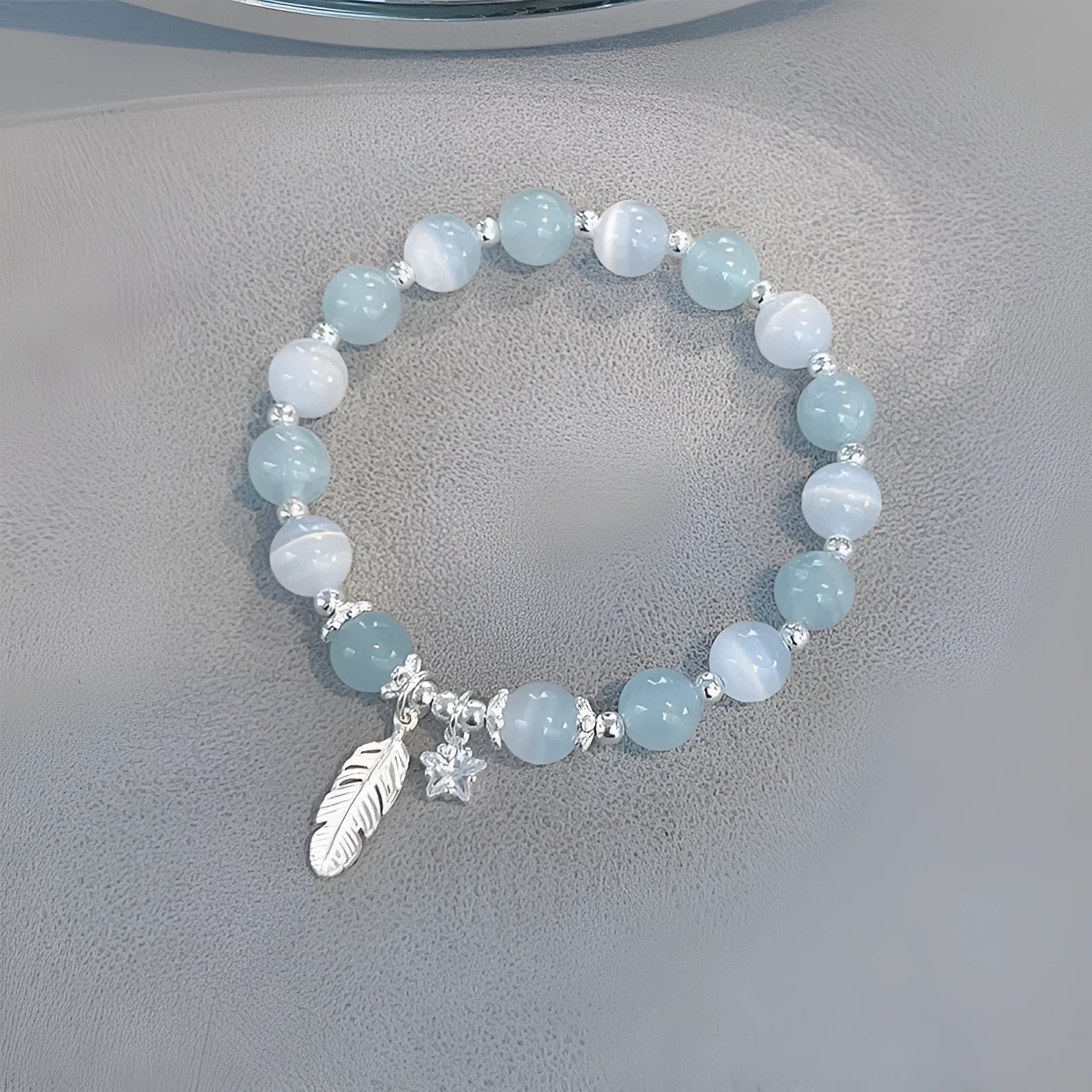 Korean style crystal bracelet with feather XINGX blue moonlight colour and eight Awn star design