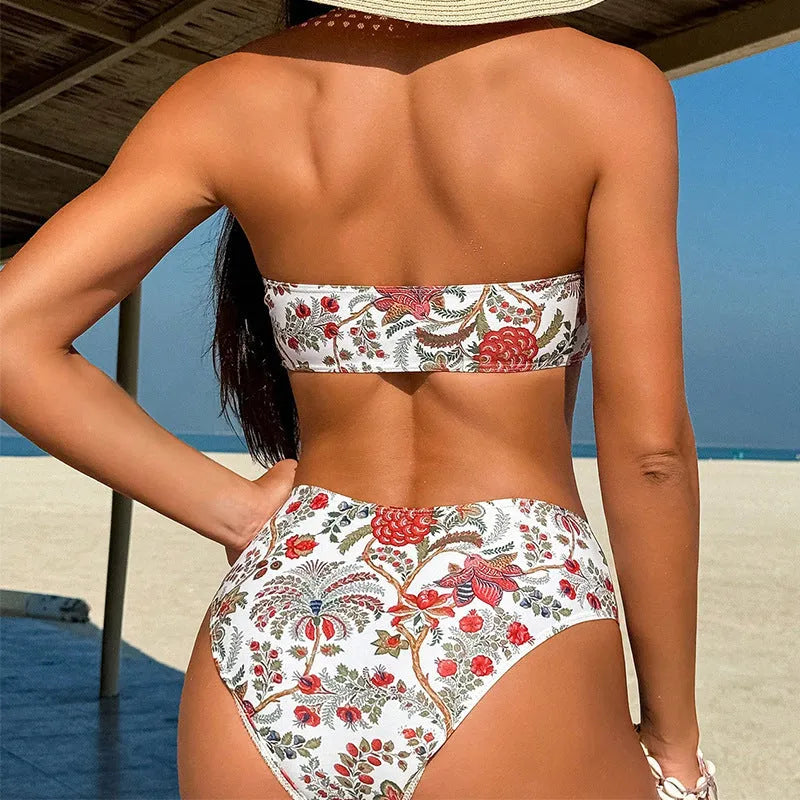 Women's printed bandeau bikini set with matching shorts on a neutral background.