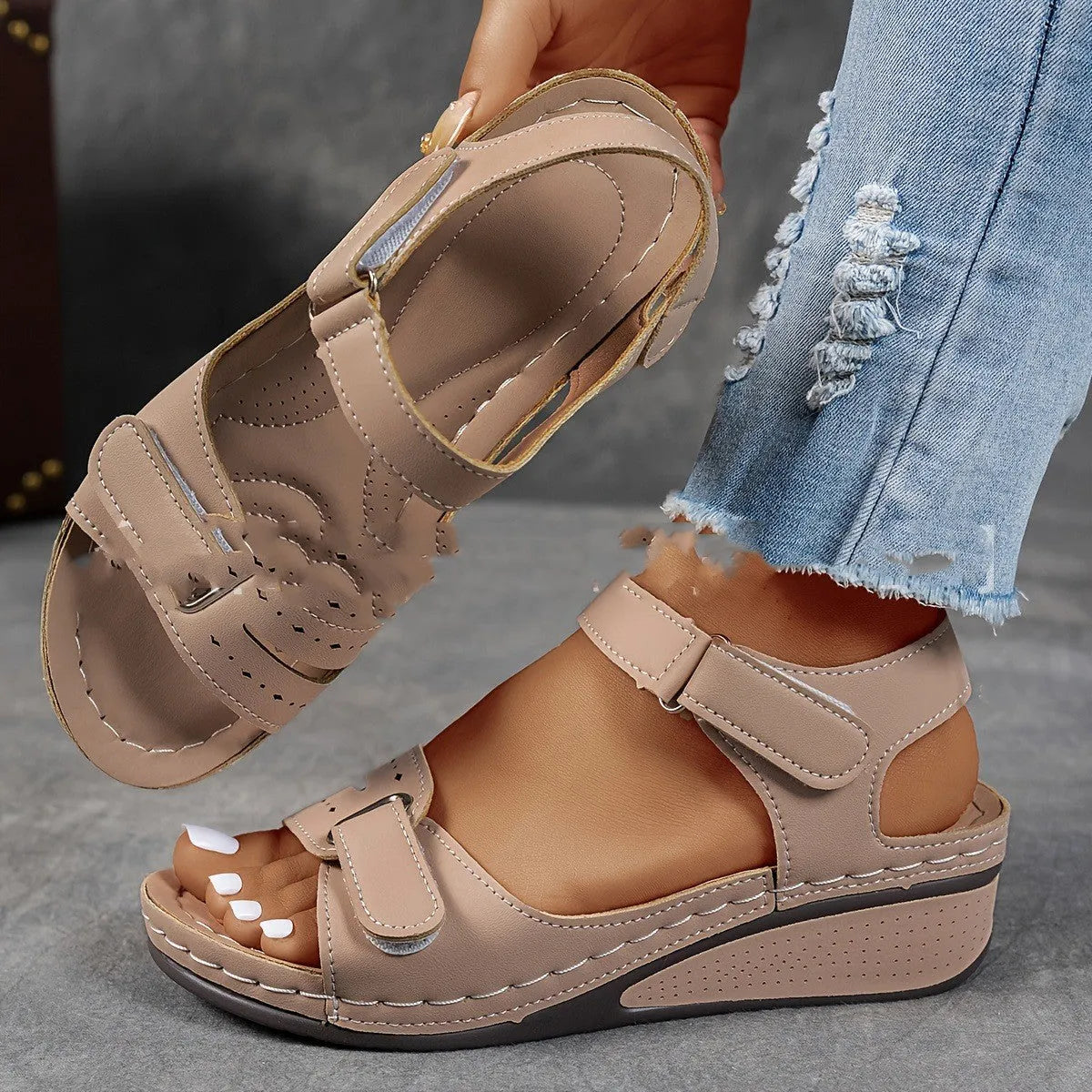 Women's thick bottom strap sandals with Velcro fastening in beige colour showing round toe and composite sole