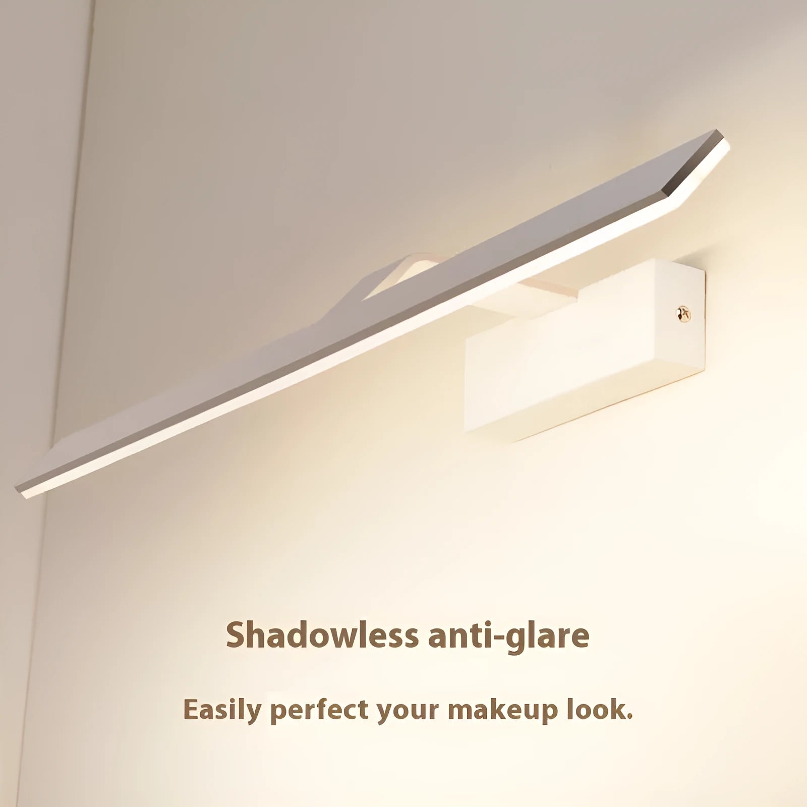White LED bathroom mirror headlight with three-colour dimming on a vanity.
