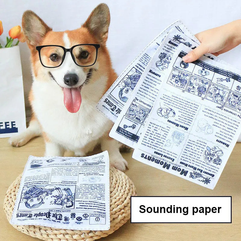 Realistic newspaper texture dog toy that produces squeaking sounds during play