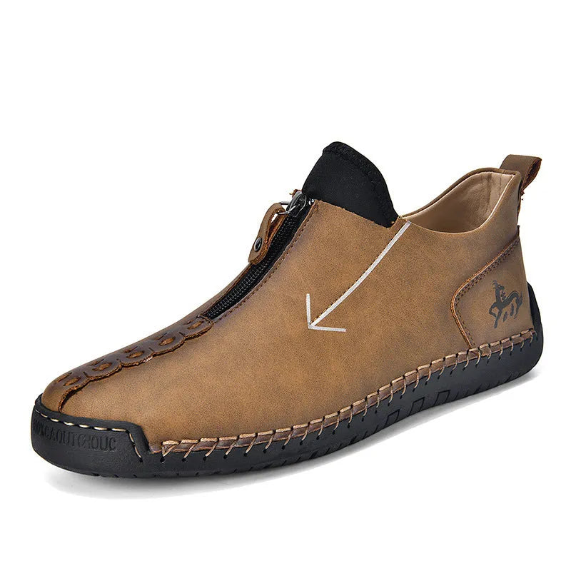 Men's black front zip Martin style boots with round toe and low rubber sole.