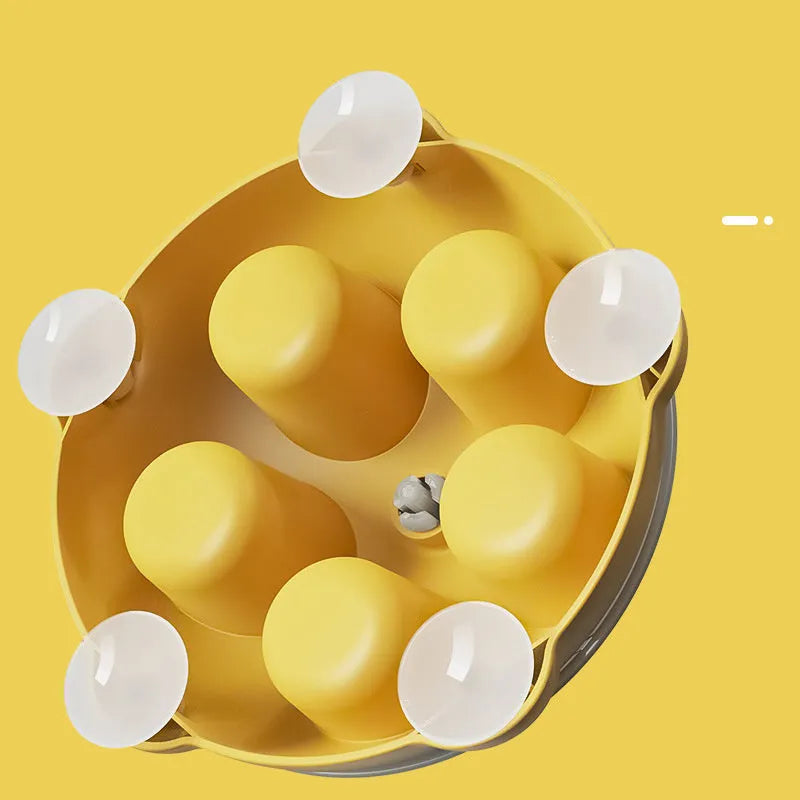 Yellow cat snack bowl with separate compartments and non-slip base pet toy