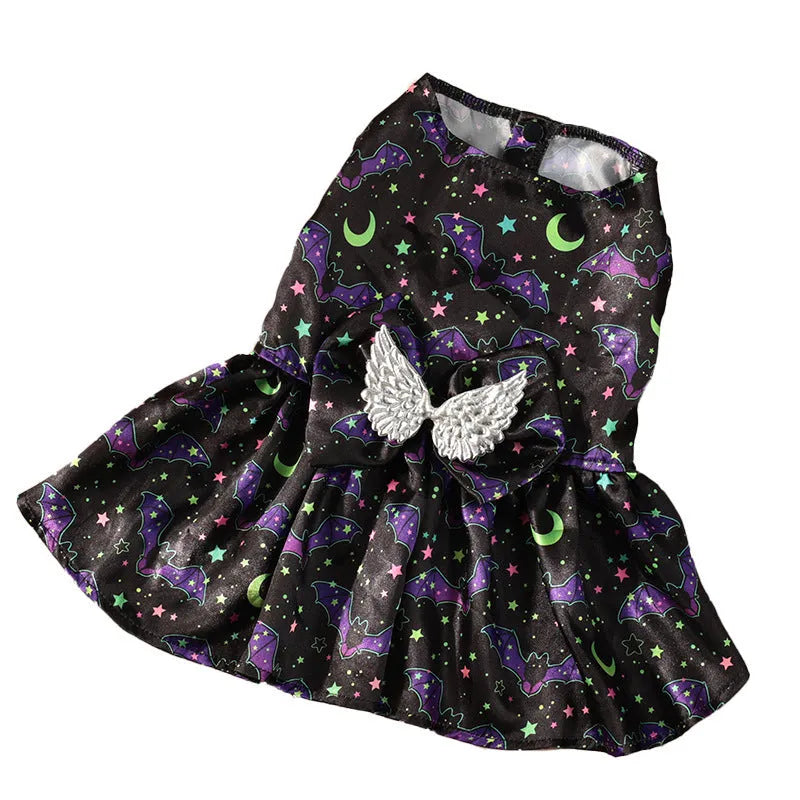 Halloween dog costume with angel wings in bright pumpkin orange and bat print patterns