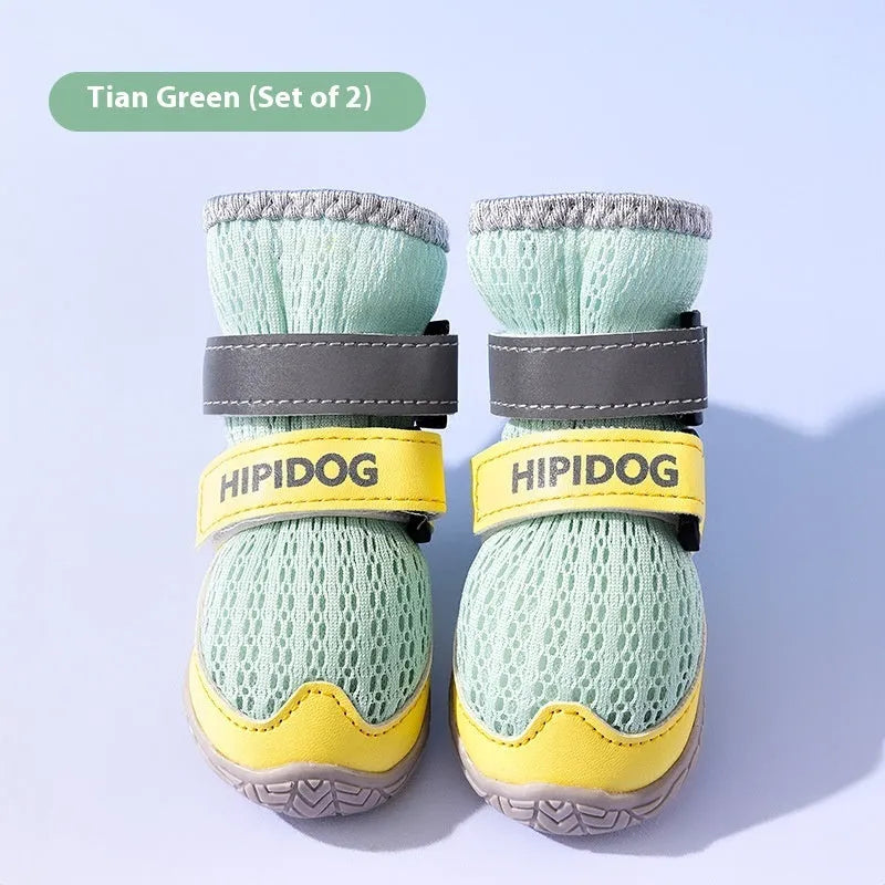 Cartoon style blue and green dog shoes made from PU material for summer wear.