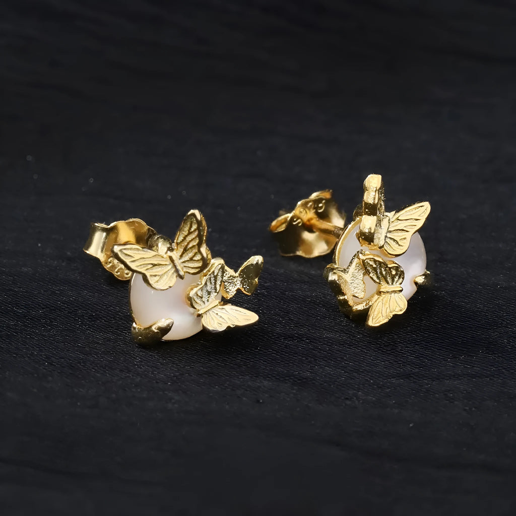Original design butterfly ear studs in 925 silver with gold electroplated finish.