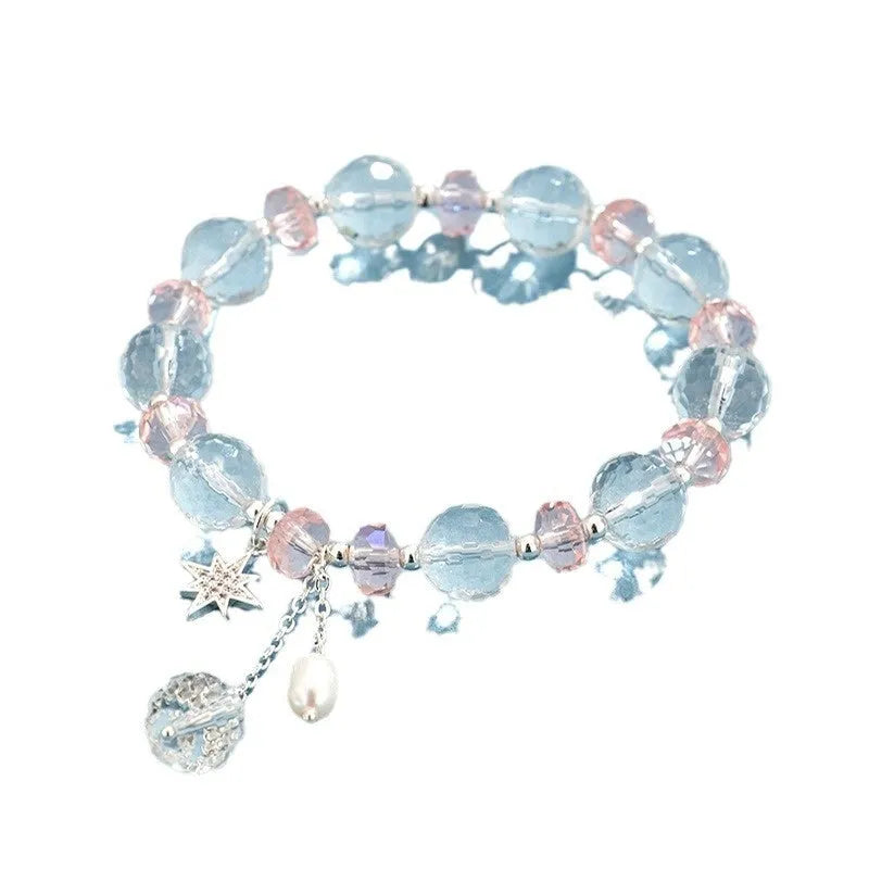 Women's white crystal bracelet with lucky cat charm and diamond design elements