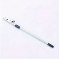 Gold-plated iron rod alligator clip note holder 155mm on a desk holding a paper note