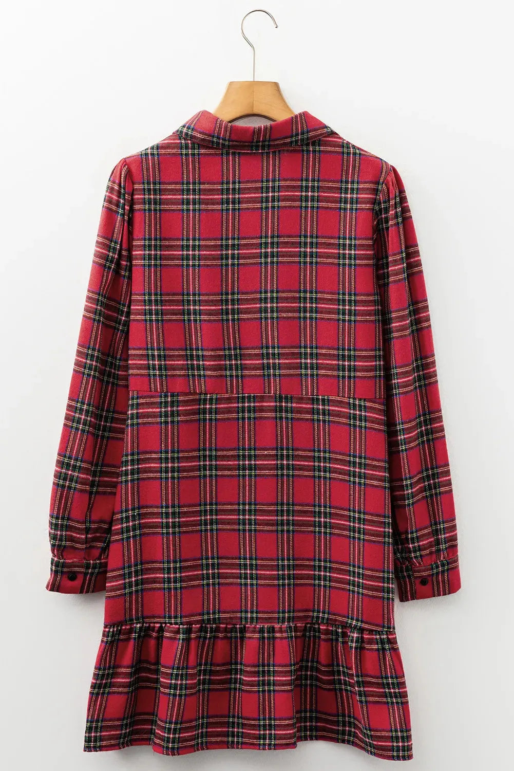 Red and black plaid women's mini dress with a shirt collar, half-button front, long sleeves, and a ruffle hem.