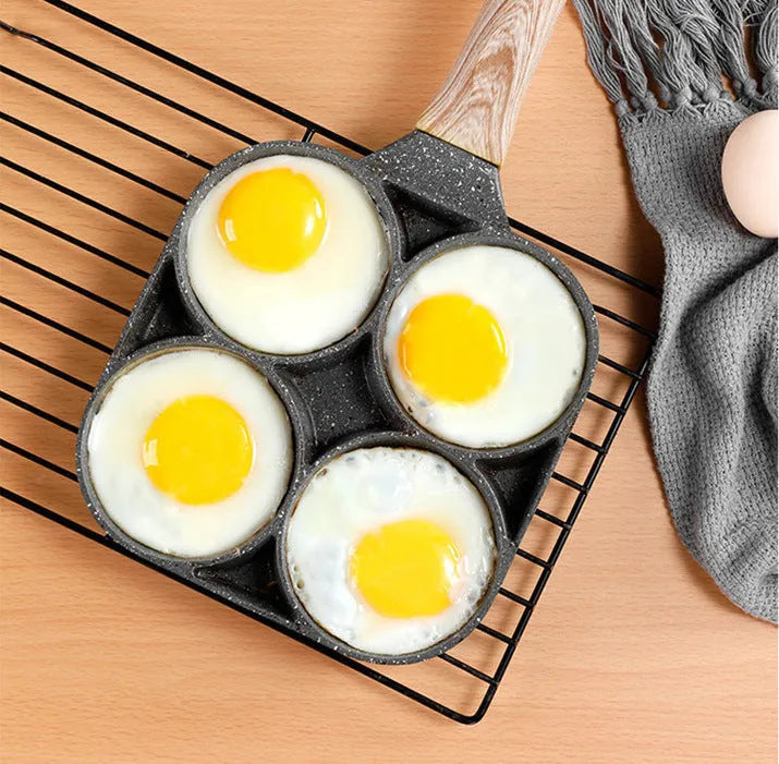 Non-stick aluminium egg dumpling frying pan with four round holes for cooking breakfast burgers or dumplings