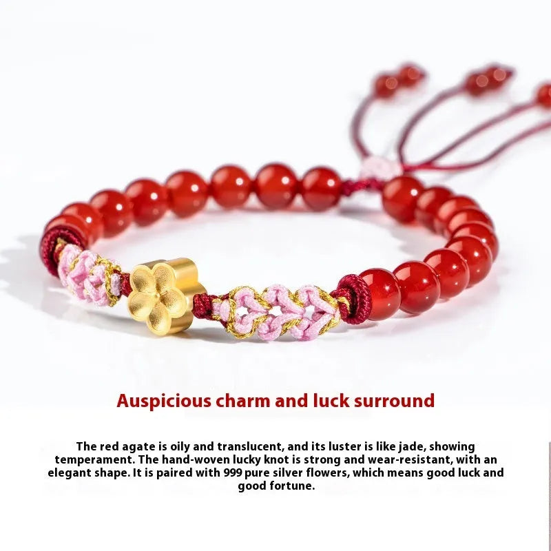 Hand-woven red rope bracelet with diamond-shaped crystal peach blossom charm in Chinese style