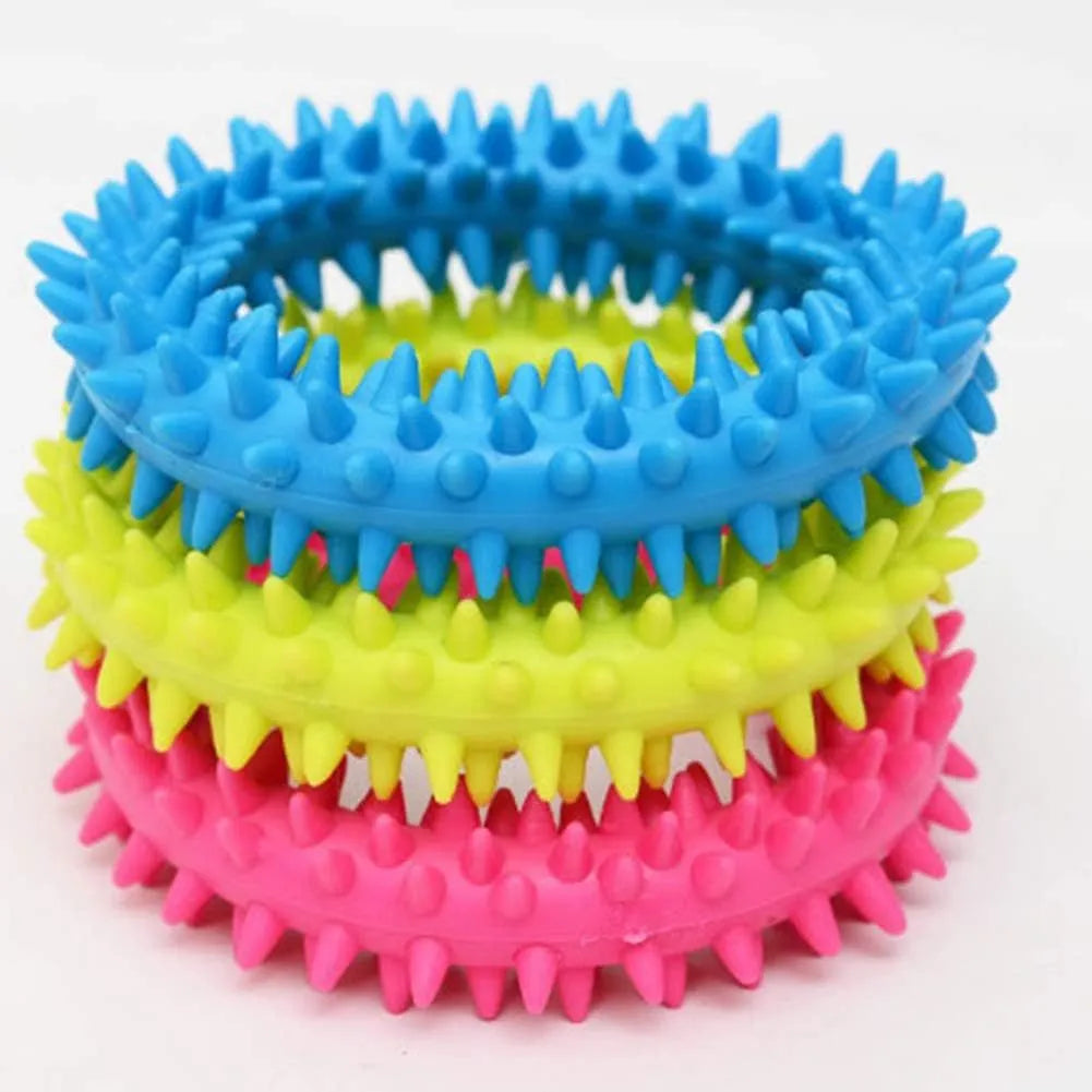 Blue spiky circle ring dog chew toy made of TPR for bite training and dental cleaning.