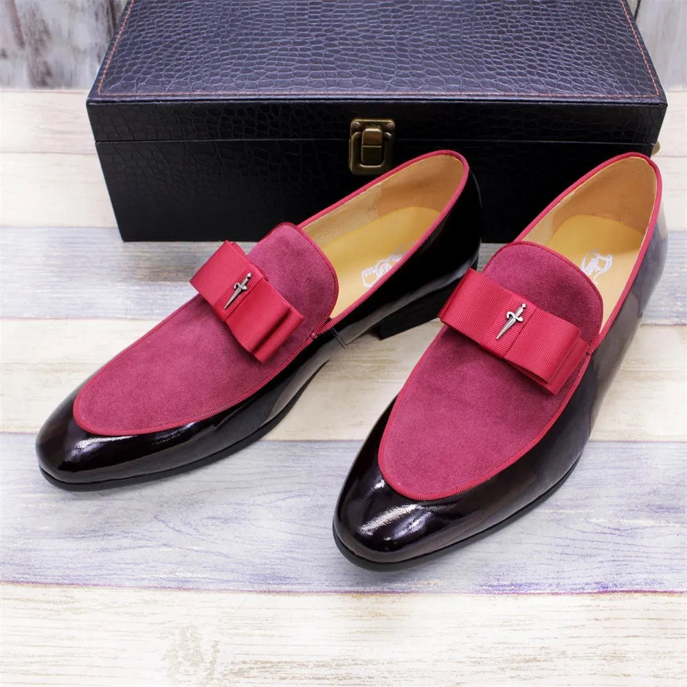 Men's low-top leather shoes in patent black with a tassel detail and rubber sole.
