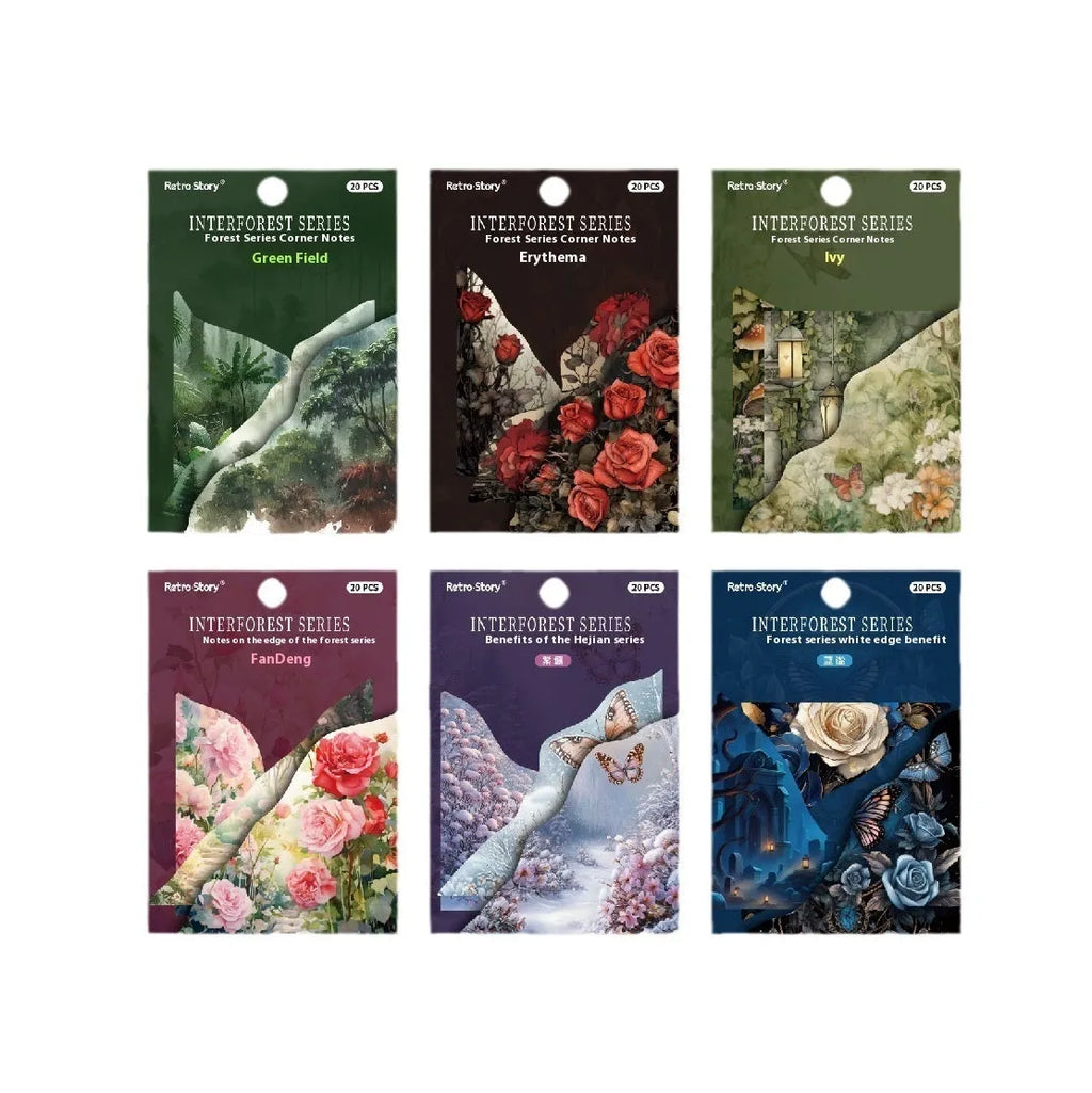 Pack of colourful blank adhesive paper notes in spring botanical colours on a desk.