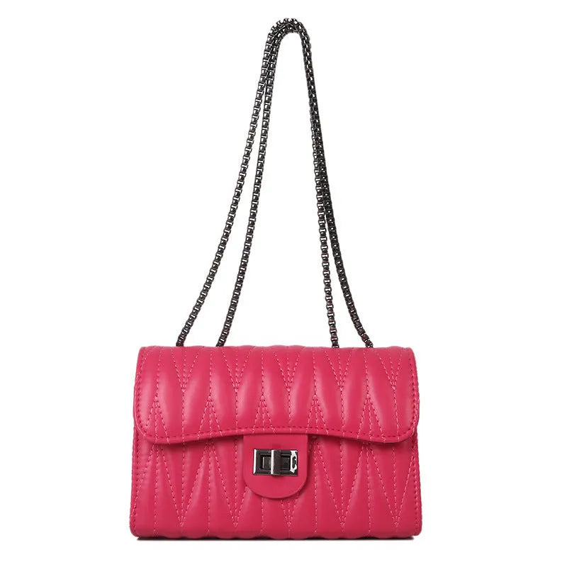 Small textured diamond pattern women's PU bag in a horizontal square shape with a single shoulder strap.