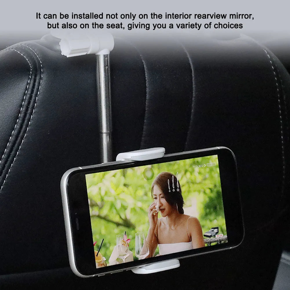 Black car phone holder mounted with 360-degree rotation adjustment mechanism visible