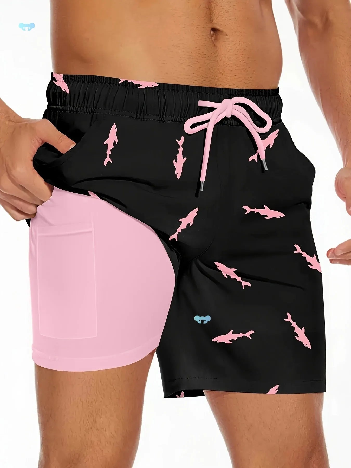 Men's black shark print beach shorts with drawstring waist on a straight-leg short