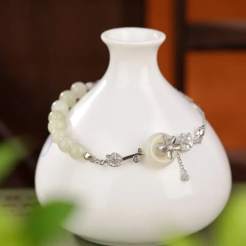 Hetian jade lotus peace buckle silver bracelet for women with retro antique style