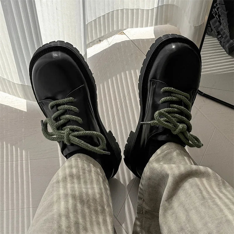 Men's derby style platform shoes with a microfiber upper and rubber sole.